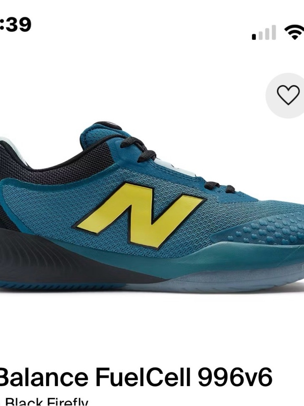 New Balance teal athletic sneaker with yellow N logo